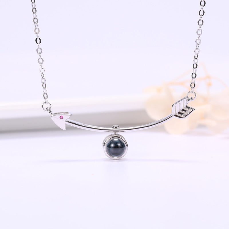 Amors Pfeil-Halskette mit verstecktem Foto