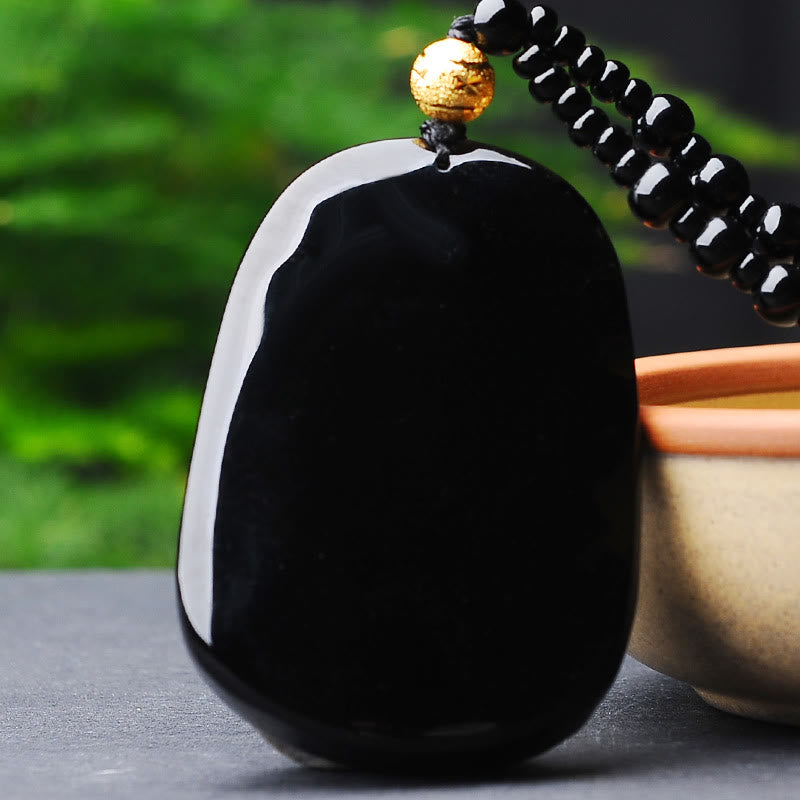 Collier pendentif porte-bonheur en obsidienne dragon plaqué or 18 carats de Buddha Stones 