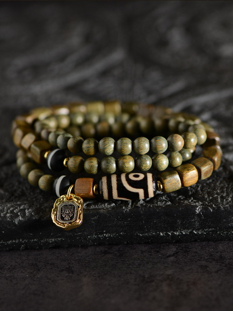 Bracelet de perles Dzi à deux yeux en agate de bois de santal vert