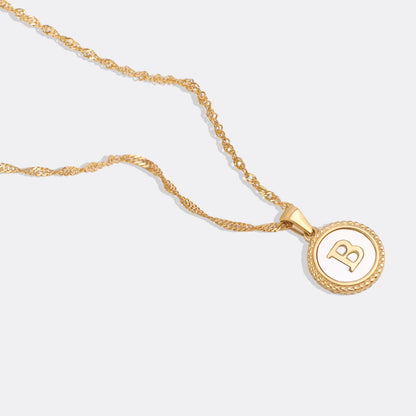 Collier lettre disque en nacre