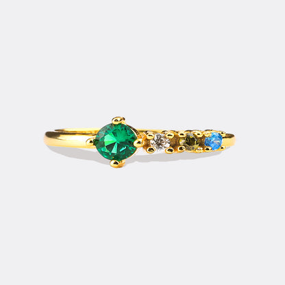 Bague avec pierres de naissance familiales