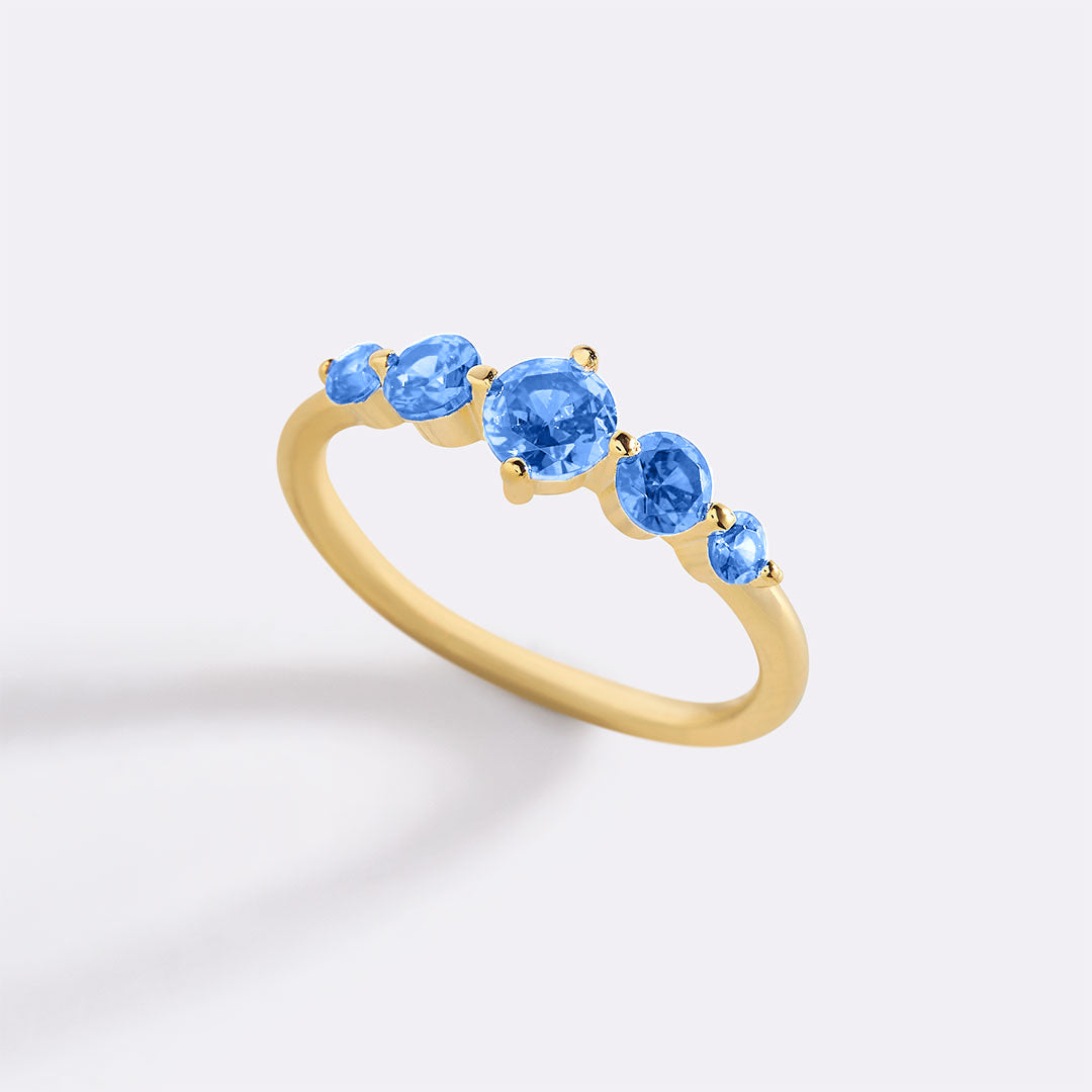 Bague de déclaration à cinq pierres de naissance