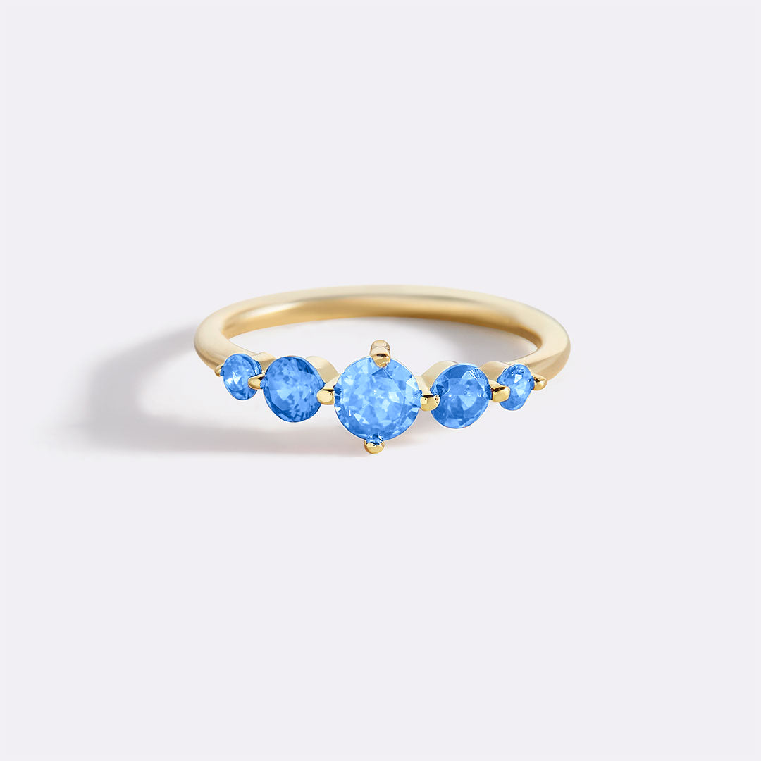 Bague de déclaration à cinq pierres de naissance