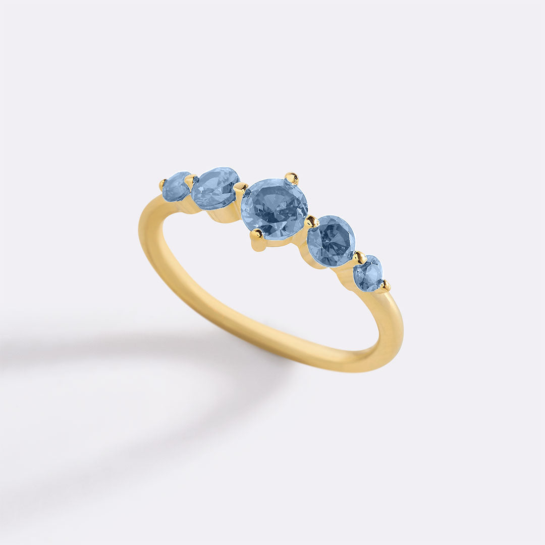 Bague de déclaration à cinq pierres de naissance
