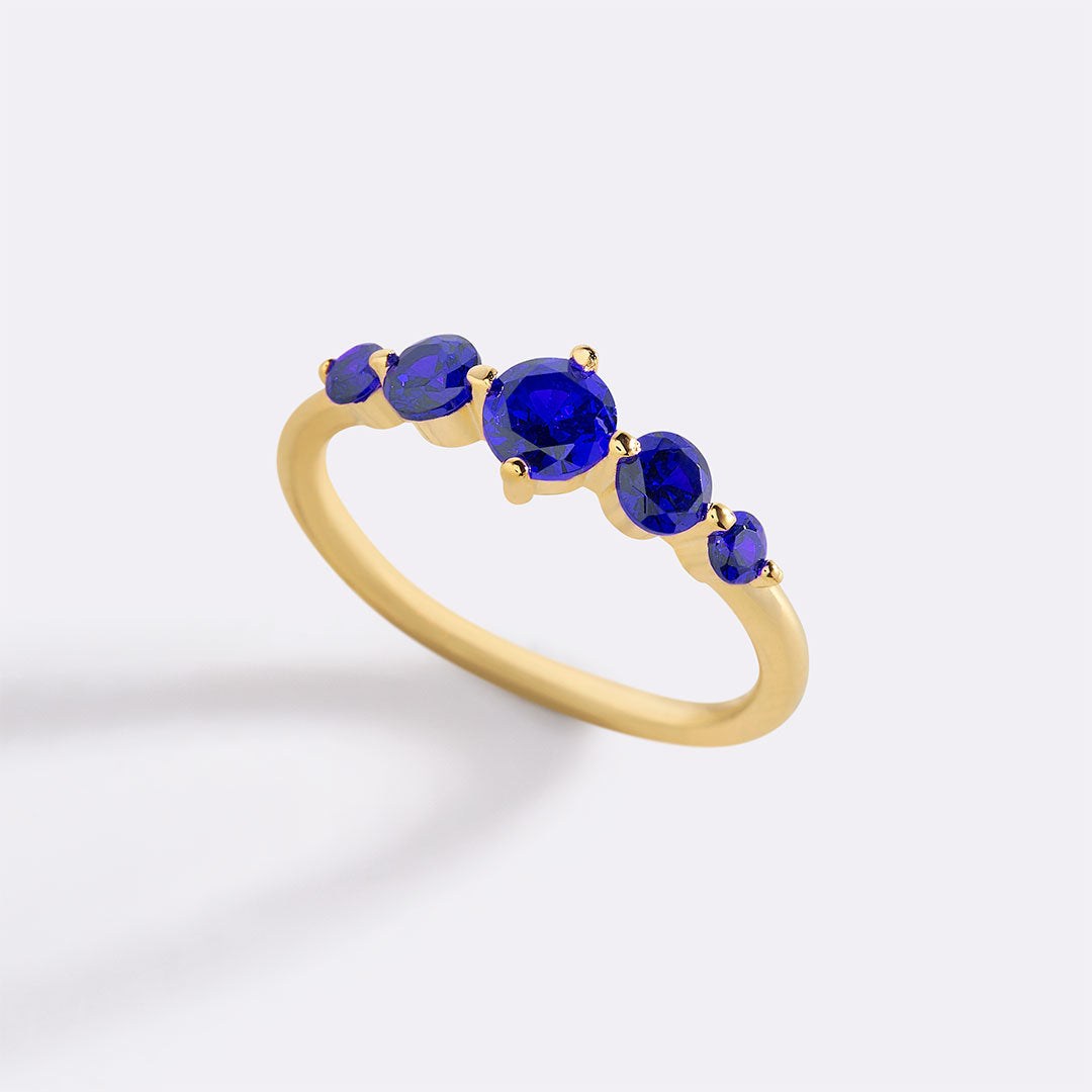 Bague de déclaration à cinq pierres de naissance