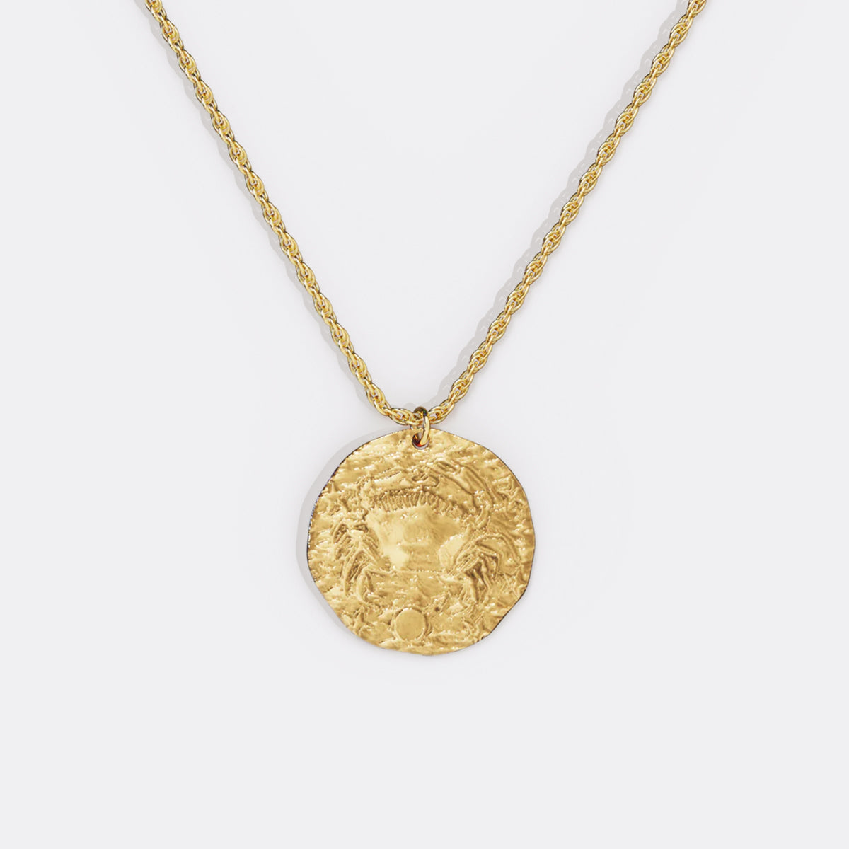 Collier pendentif zodiaque en or martelé