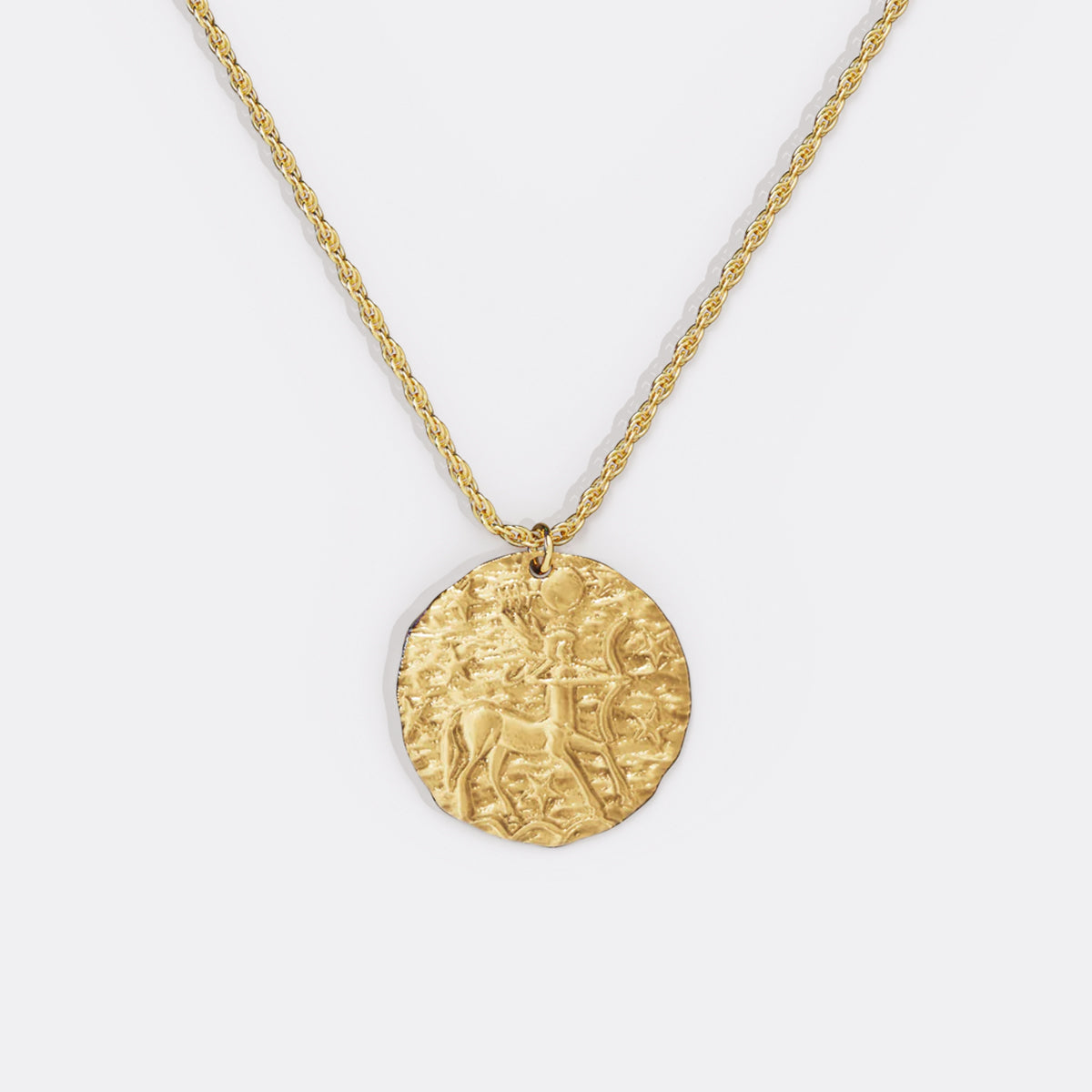 Collier pendentif zodiaque en or martelé