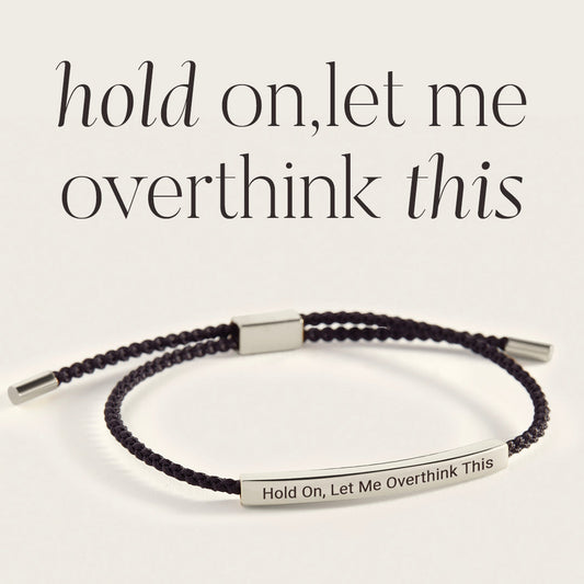 Attendez, laissez-moi réfléchir à ce bracelet inspirant