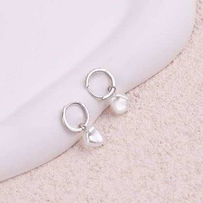 Boucles d'oreilles créoles pavées de perles d'eau douce