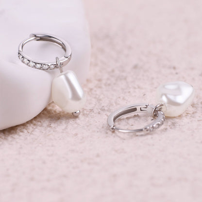 Boucles d'oreilles créoles pavées de perles d'eau douce