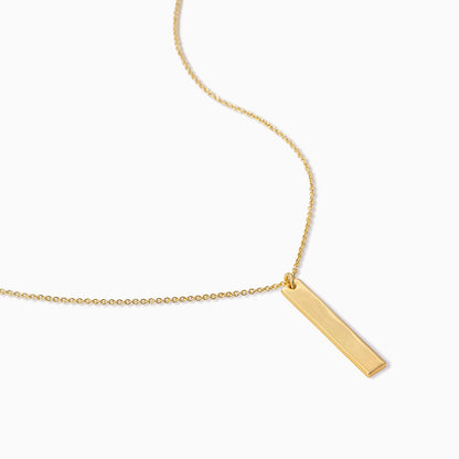 Collier à barre verticale
