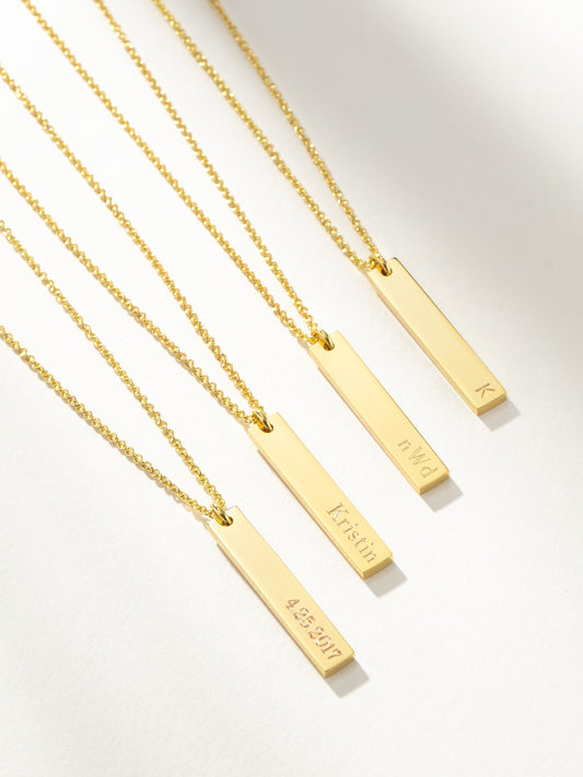 Collier à barre verticale