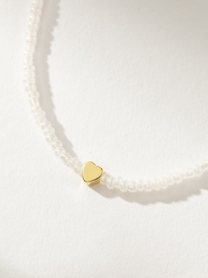 Collier de perles avec amour