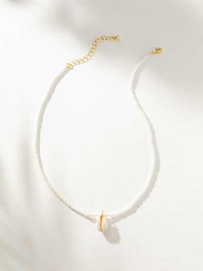 Collier de perles en coquillage Puka