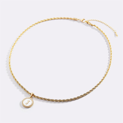 Collier lettre disque en nacre