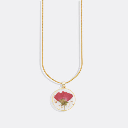 Collier de fleurs de naissance pressées