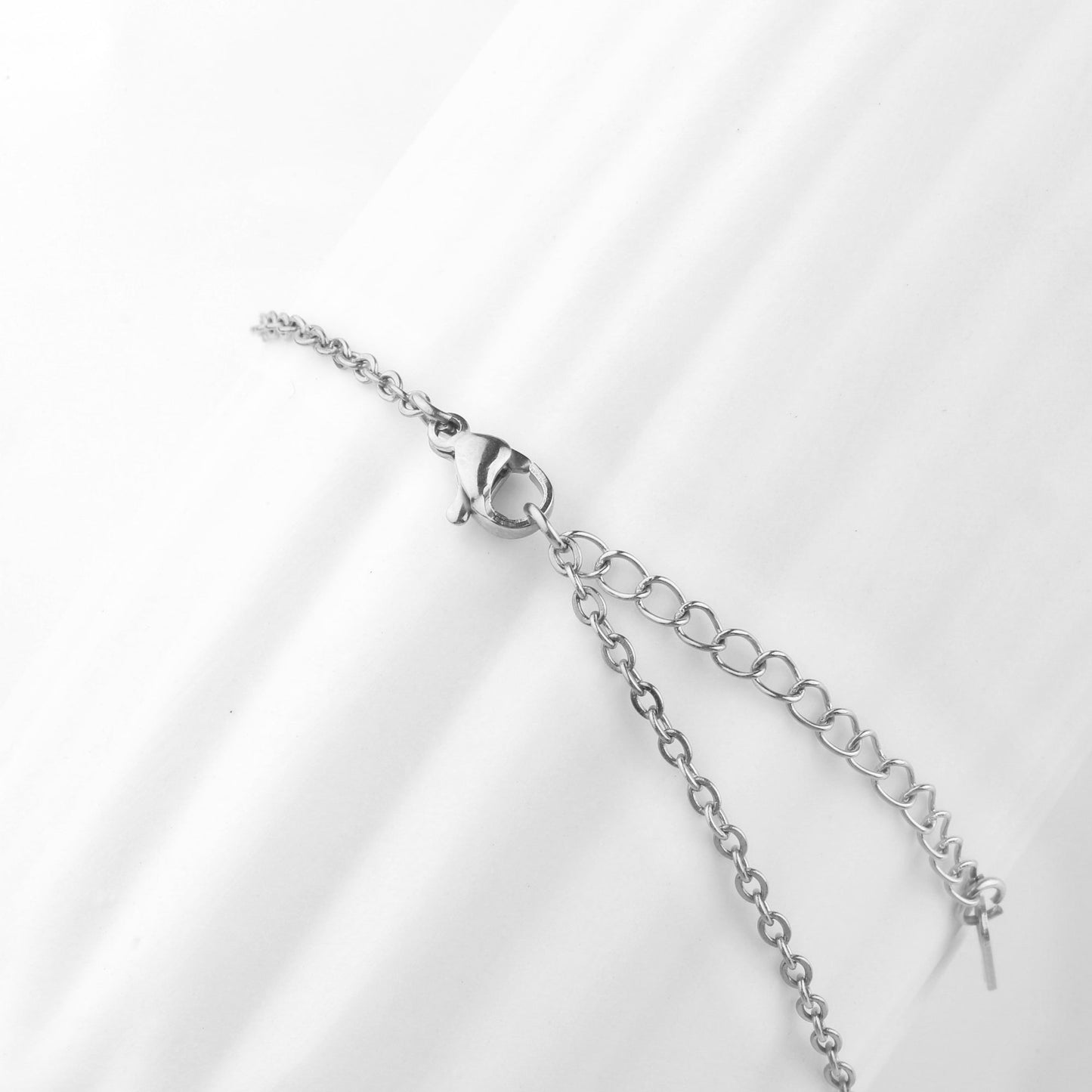 Collier avec nom en plume 