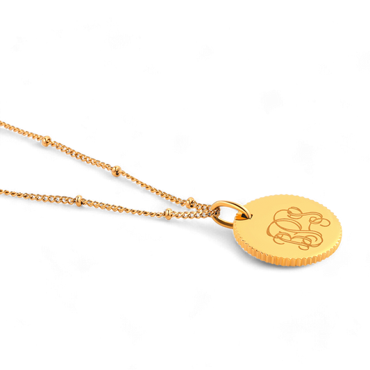 Collier avec pendentif médaillon festonné monogramme