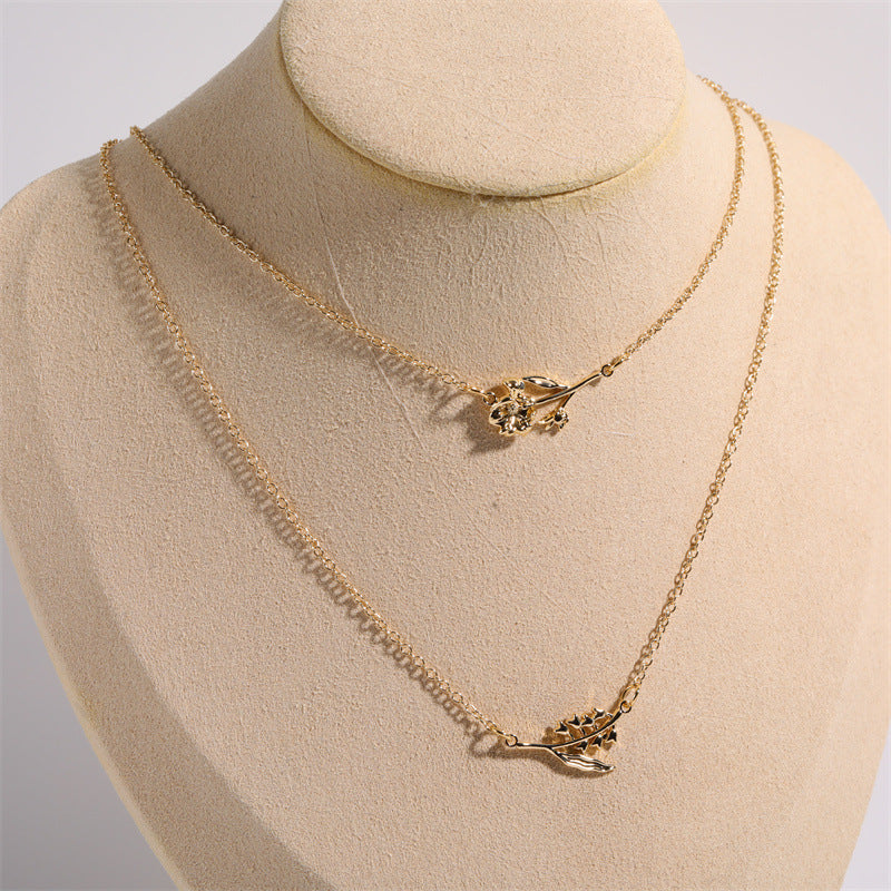 Collier délicat avec fleur de naissance