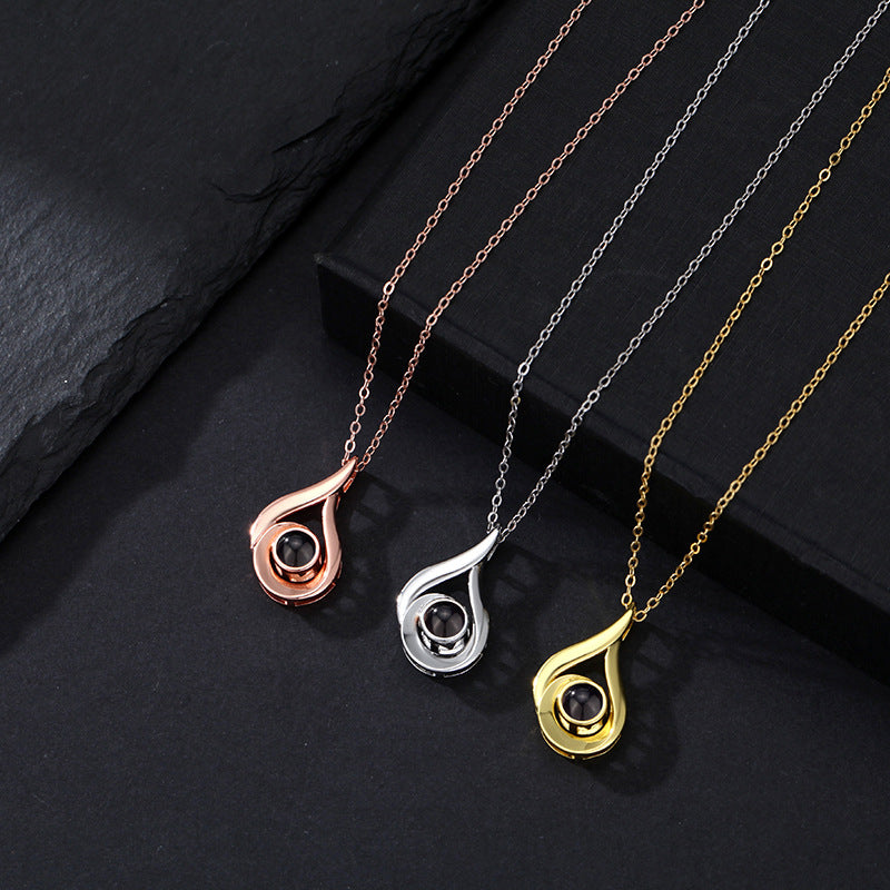 Wassertropfen-Halskette mit verstecktem Foto