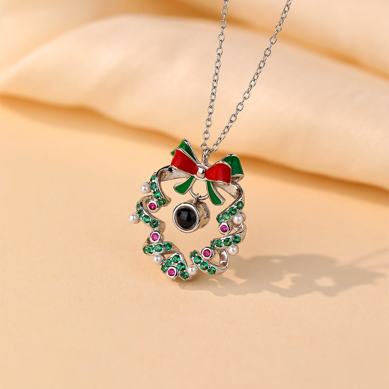 Personalisierte Weihnachtsgeschenk-Halskette mit Glockenanhänger und Foto im Inneren