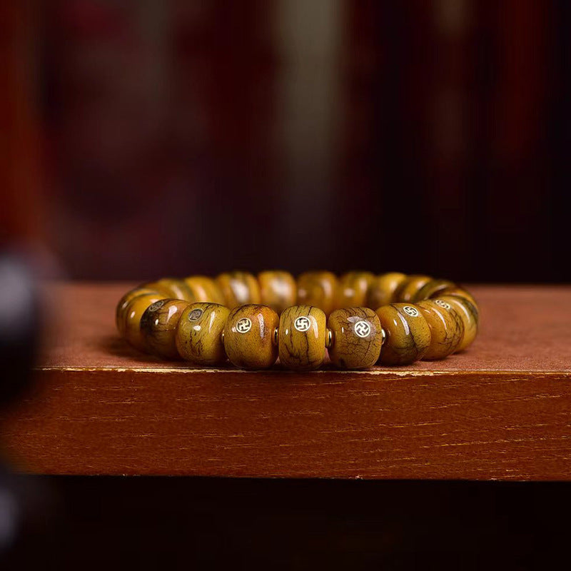 Tibetan-Style Old Copper Swastika Inlay Yak Bone Bracelet – Traditional Handcrafted Design