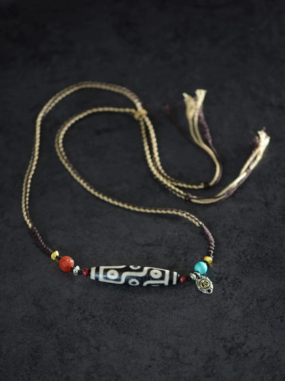 Bracelet à breloques tibétain en perles dzi à neuf yeux avec pendentif en perle