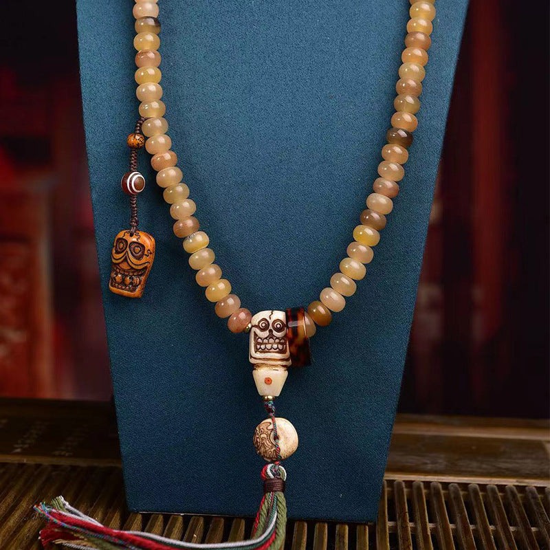Collier de prière bouddhiste tibétain traditionnel avec 108 perles de mala en corne de mouton
