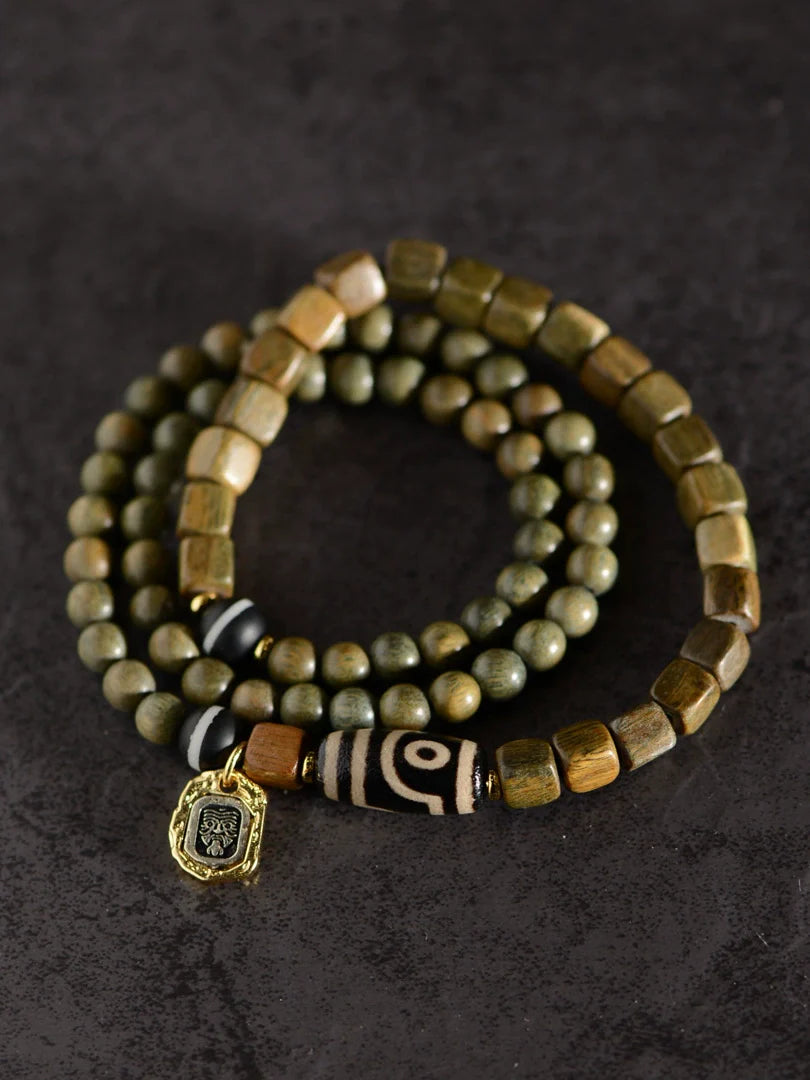 Bracelet de perles Dzi à deux yeux en agate de bois de santal vert