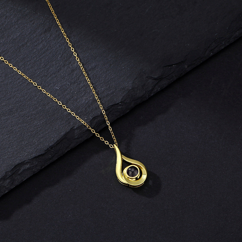 Wassertropfen-Halskette mit verstecktem Foto