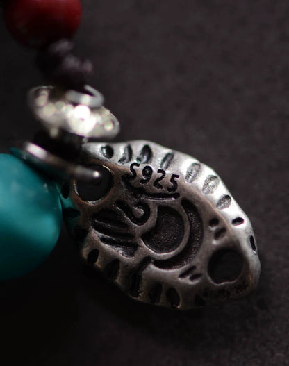 Bracelet à breloques tibétain en perles dzi à neuf yeux avec pendentif en perle