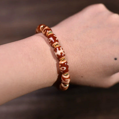 Bracelet tibétain de qualité supérieure en perles Dzi rouges et blanches