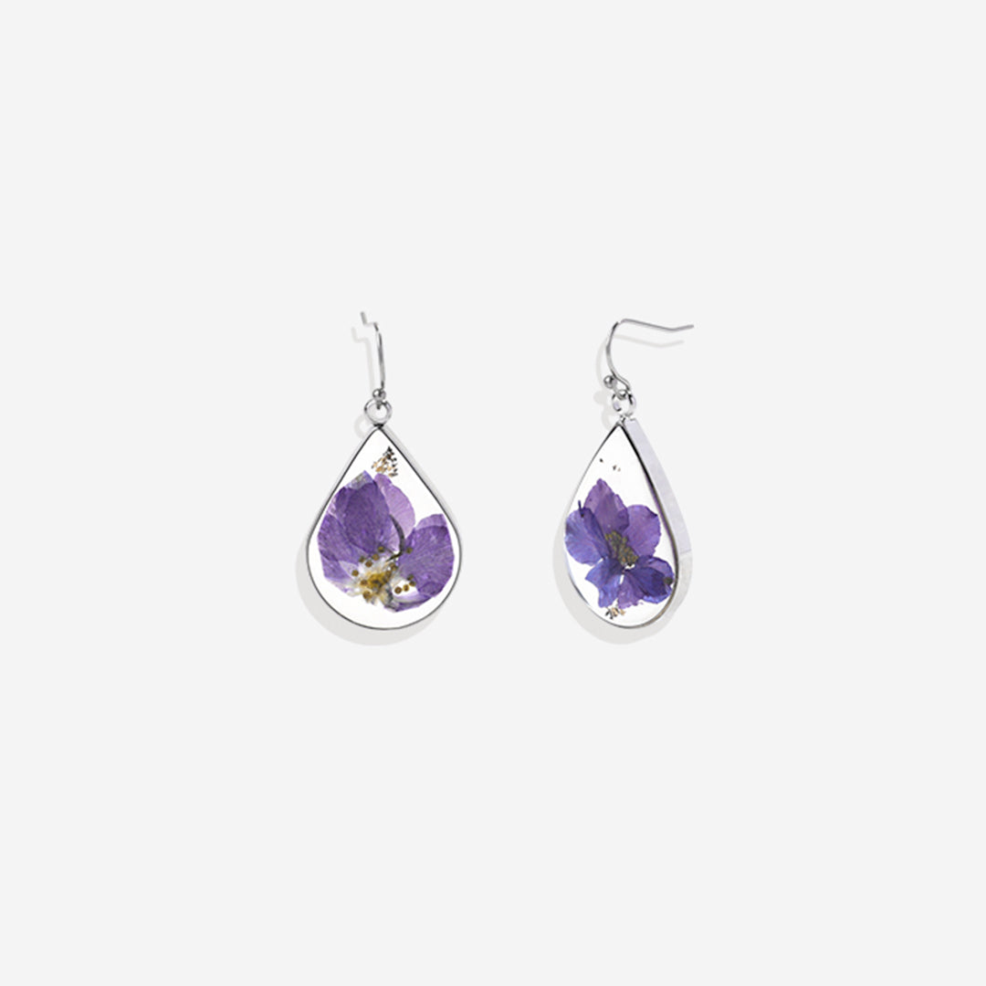 Boucles d'oreilles en fleurs de naissance pressées