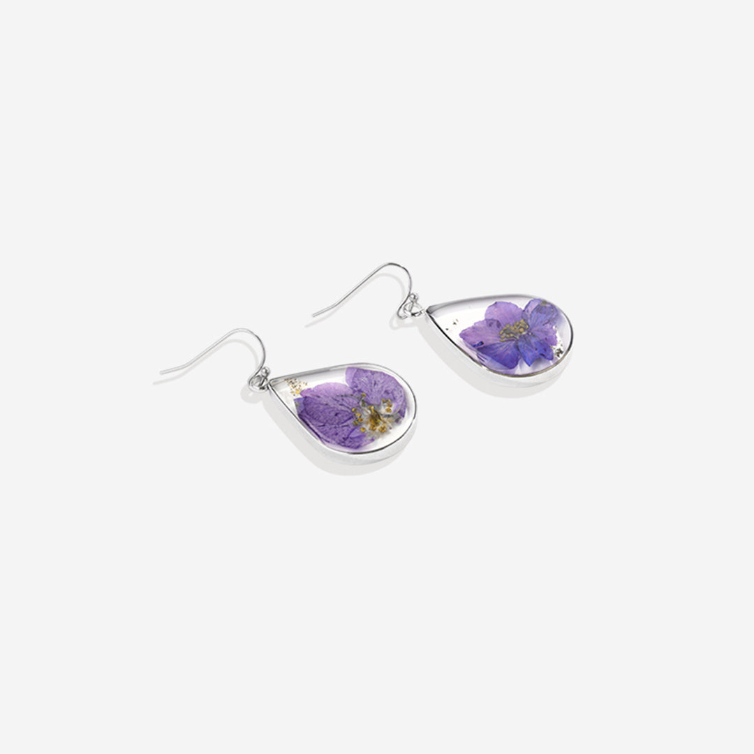 Boucles d'oreilles en fleurs de naissance pressées