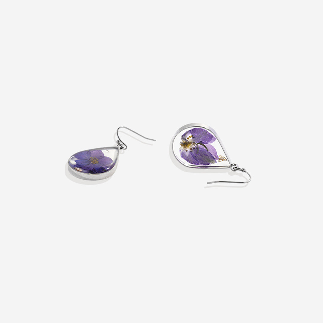 Boucles d'oreilles en fleurs de naissance pressées
