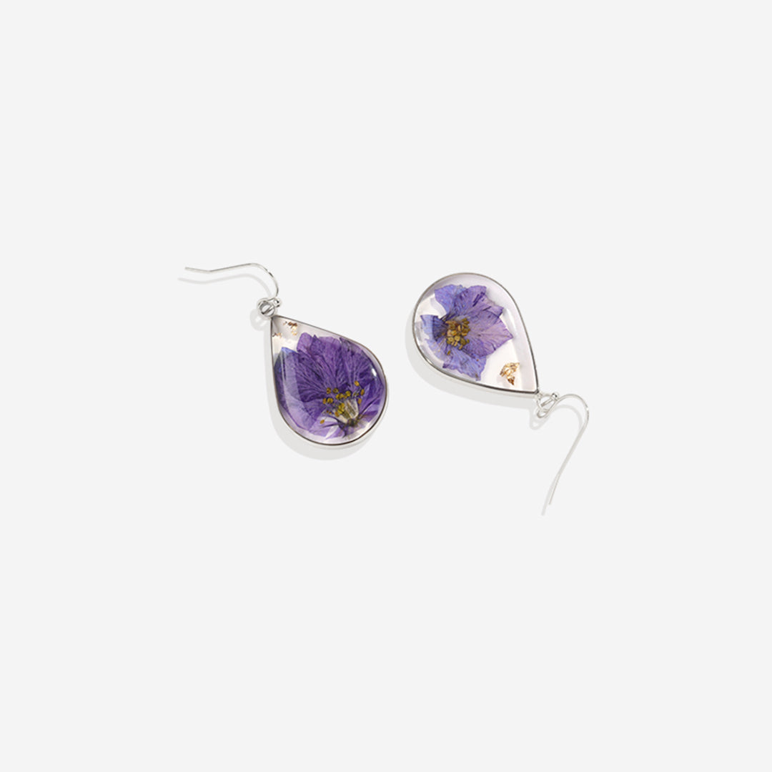 Boucles d'oreilles en fleurs de naissance pressées