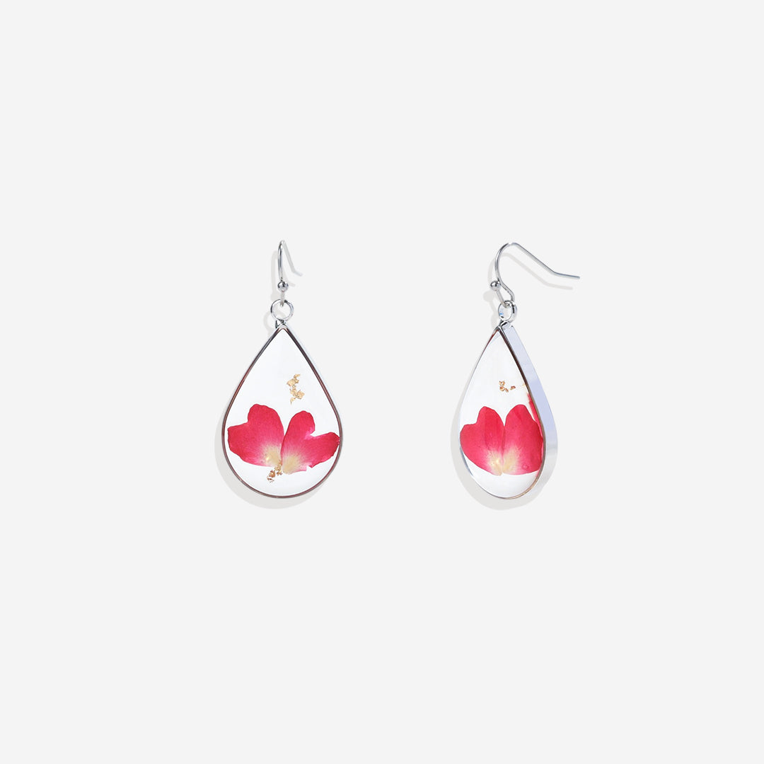 Boucles d'oreilles en fleurs de naissance pressées