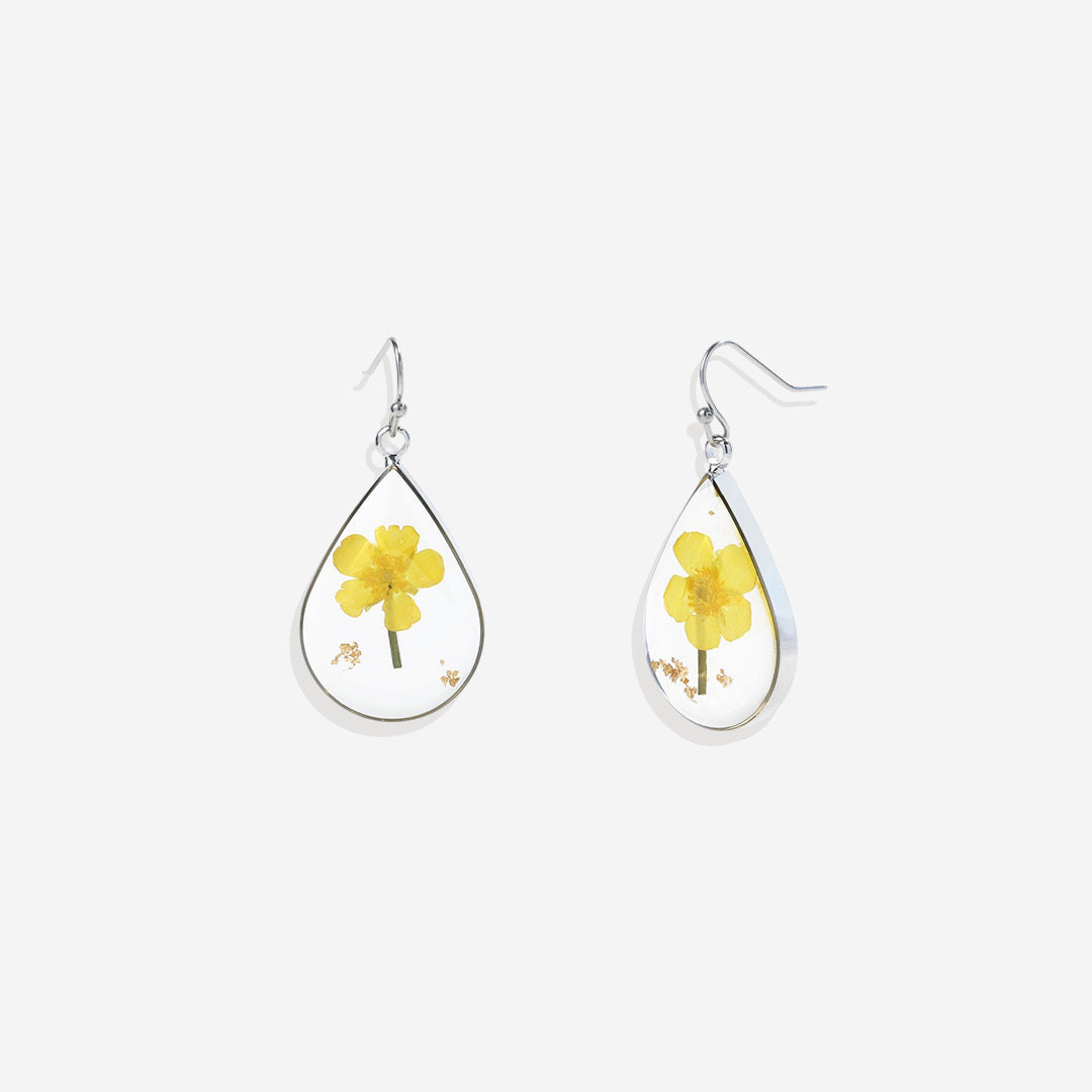 Boucles d'oreilles en fleurs de naissance pressées