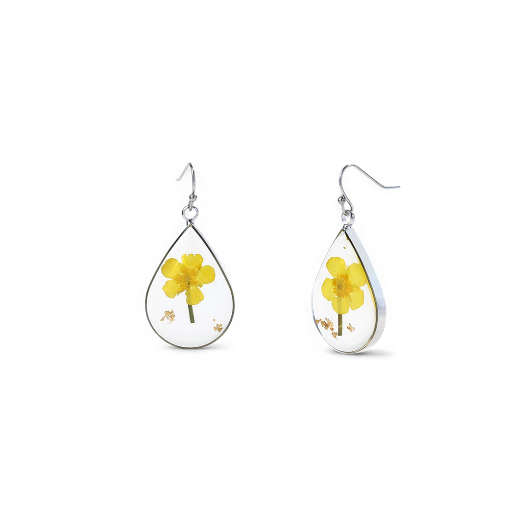 Boucles d'oreilles en fleurs de naissance pressées
