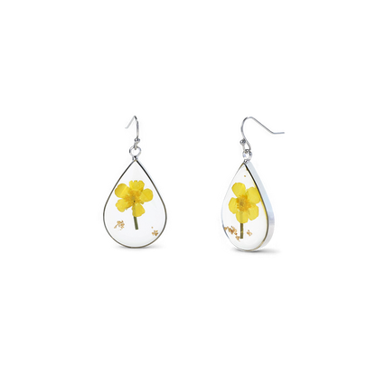 Boucles d'oreilles en fleurs de naissance pressées
