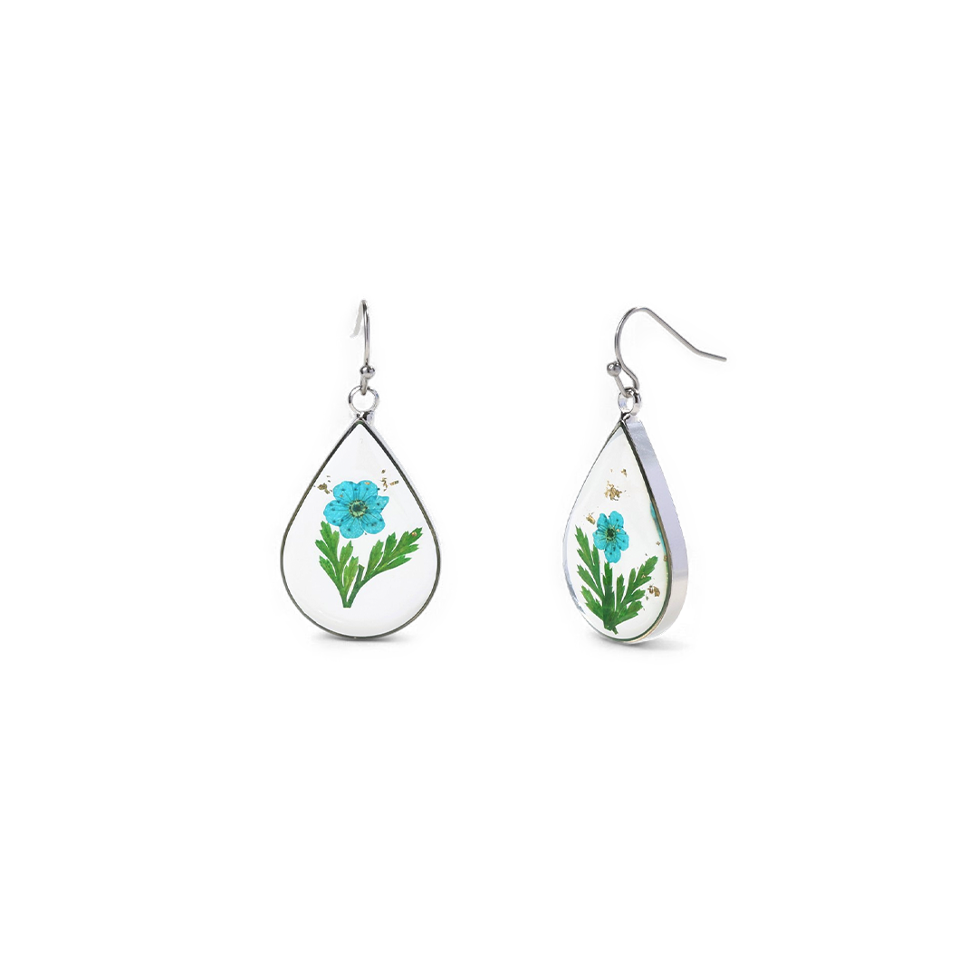 Boucles d'oreilles en fleurs de naissance pressées