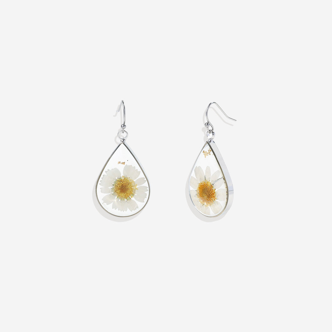 Boucles d'oreilles en fleurs de naissance pressées