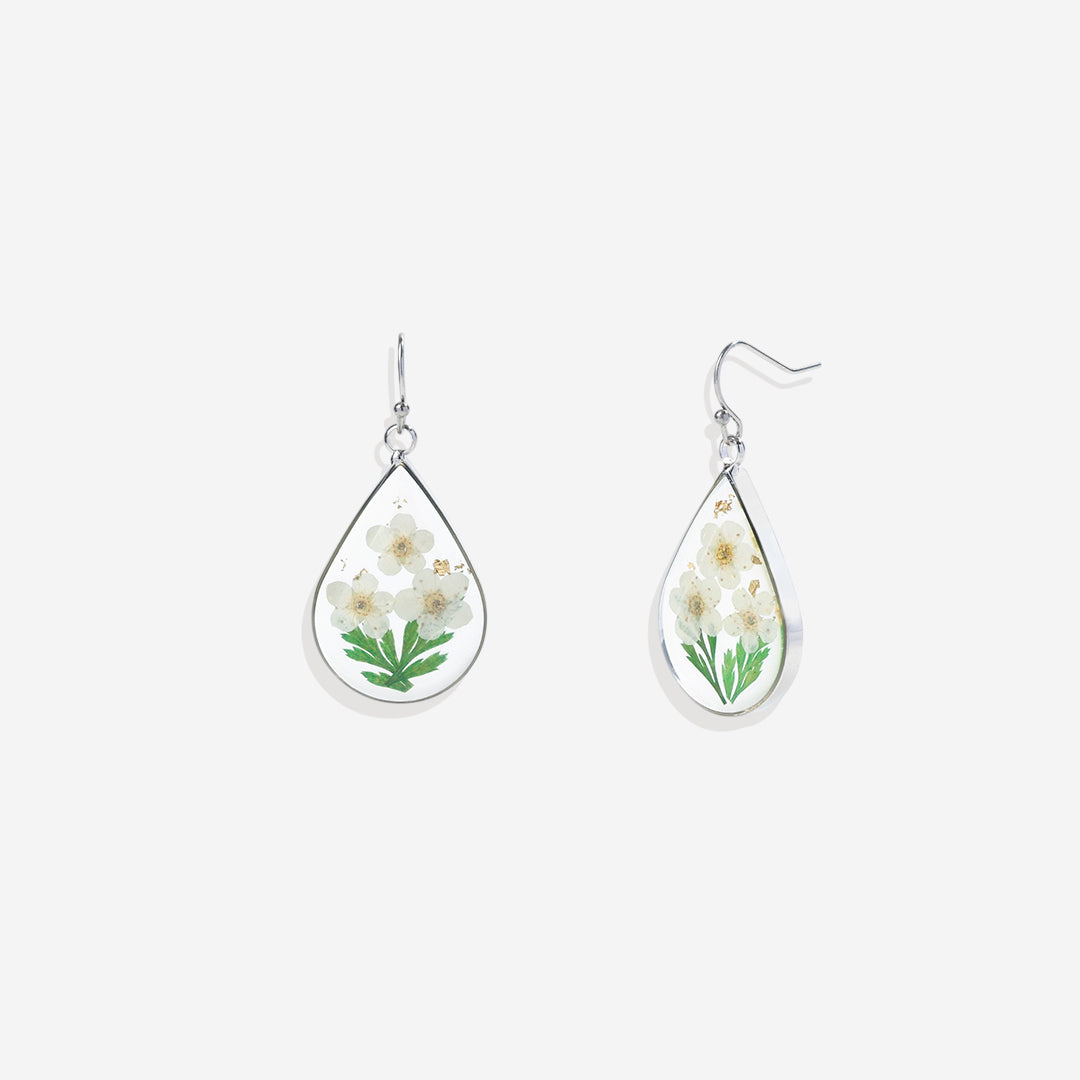 Boucles d'oreilles en fleurs de naissance pressées