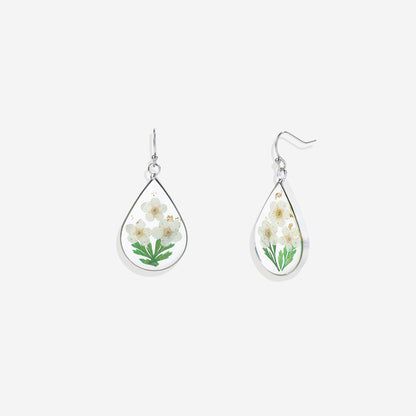 Boucles d'oreilles en fleurs de naissance pressées
