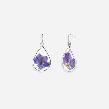 Boucles d'oreilles en fleurs de naissance pressées
