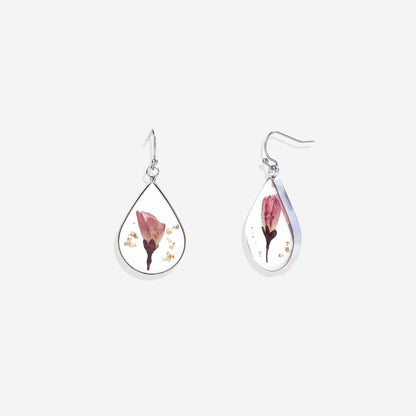Boucles d'oreilles en fleurs de naissance pressées