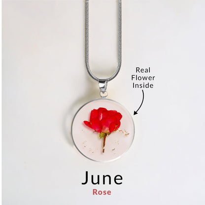 Collier de fleurs de naissance pressées