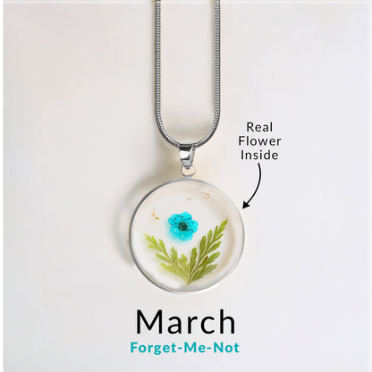 Collier de fleurs de naissance pressées