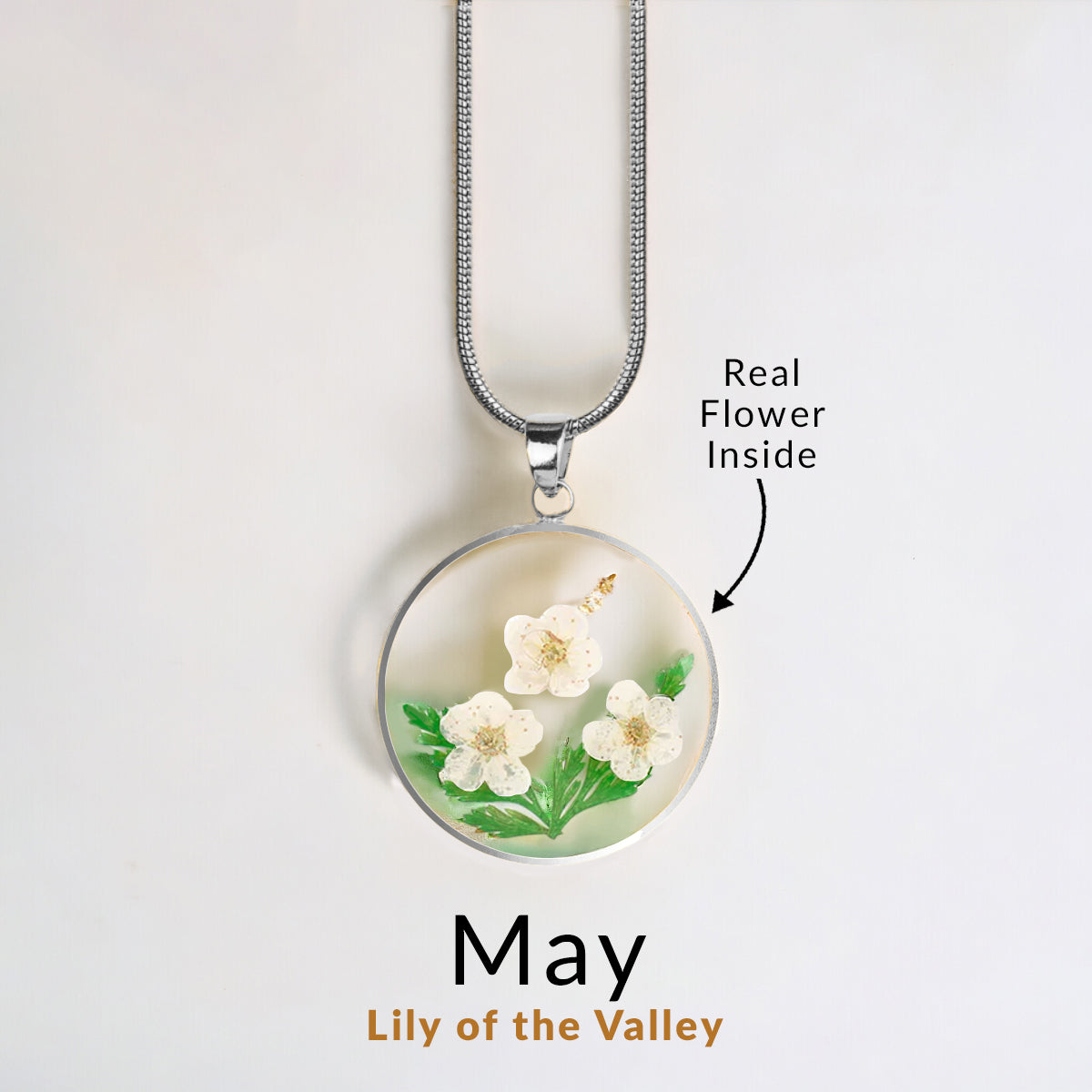 Collier de fleurs de naissance pressées