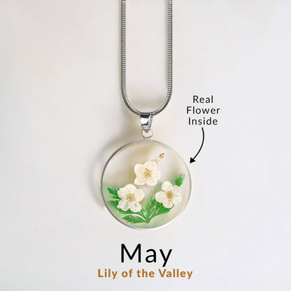 Collier de fleurs de naissance pressées